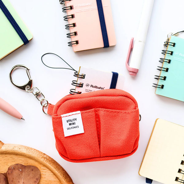 miniature Delfonics notebooks and utility pouches