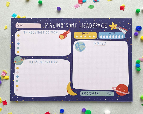 space daily planner pad